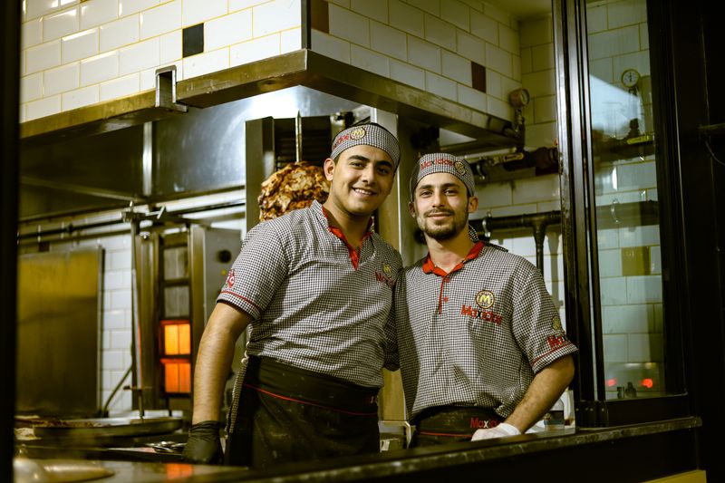 Delivery and service team ready to serve at Starbird chicken