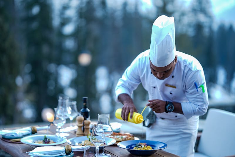 Senior sous chef at Starbird chicken preparing signature dishes